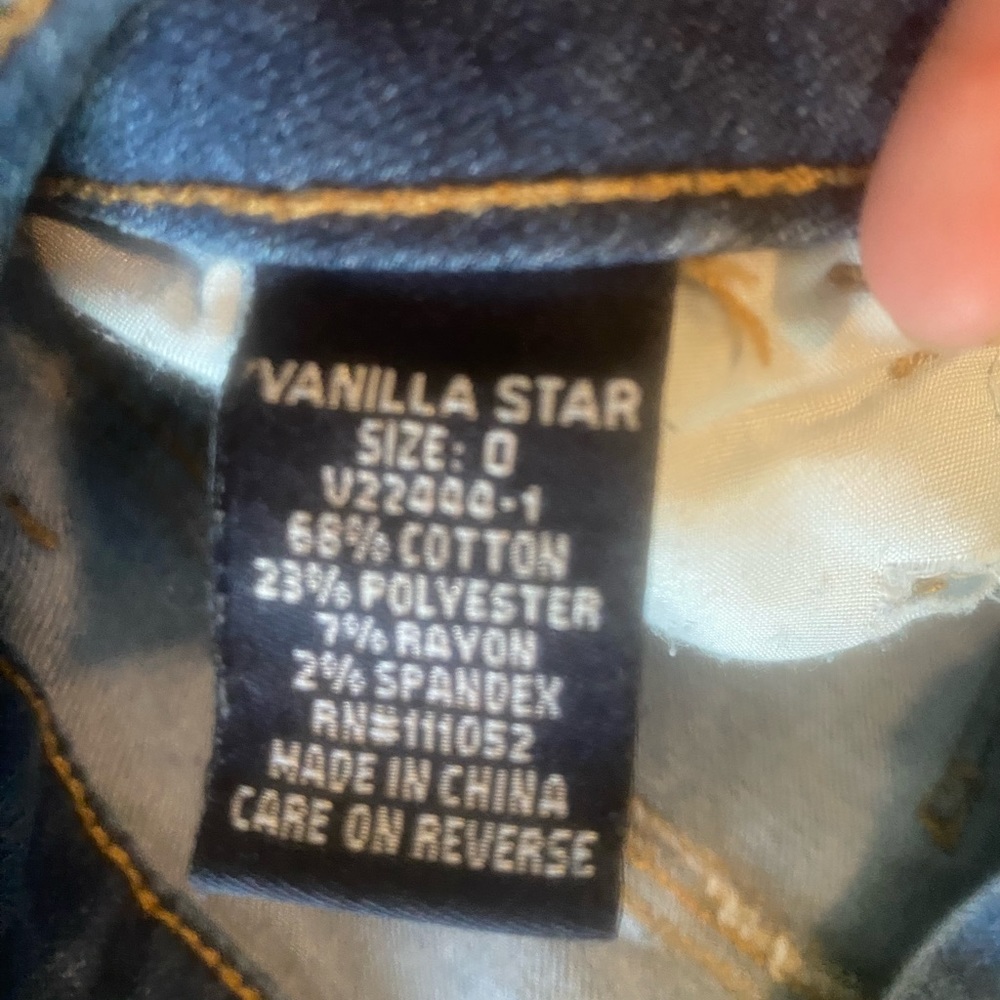 Jeans with styled holes